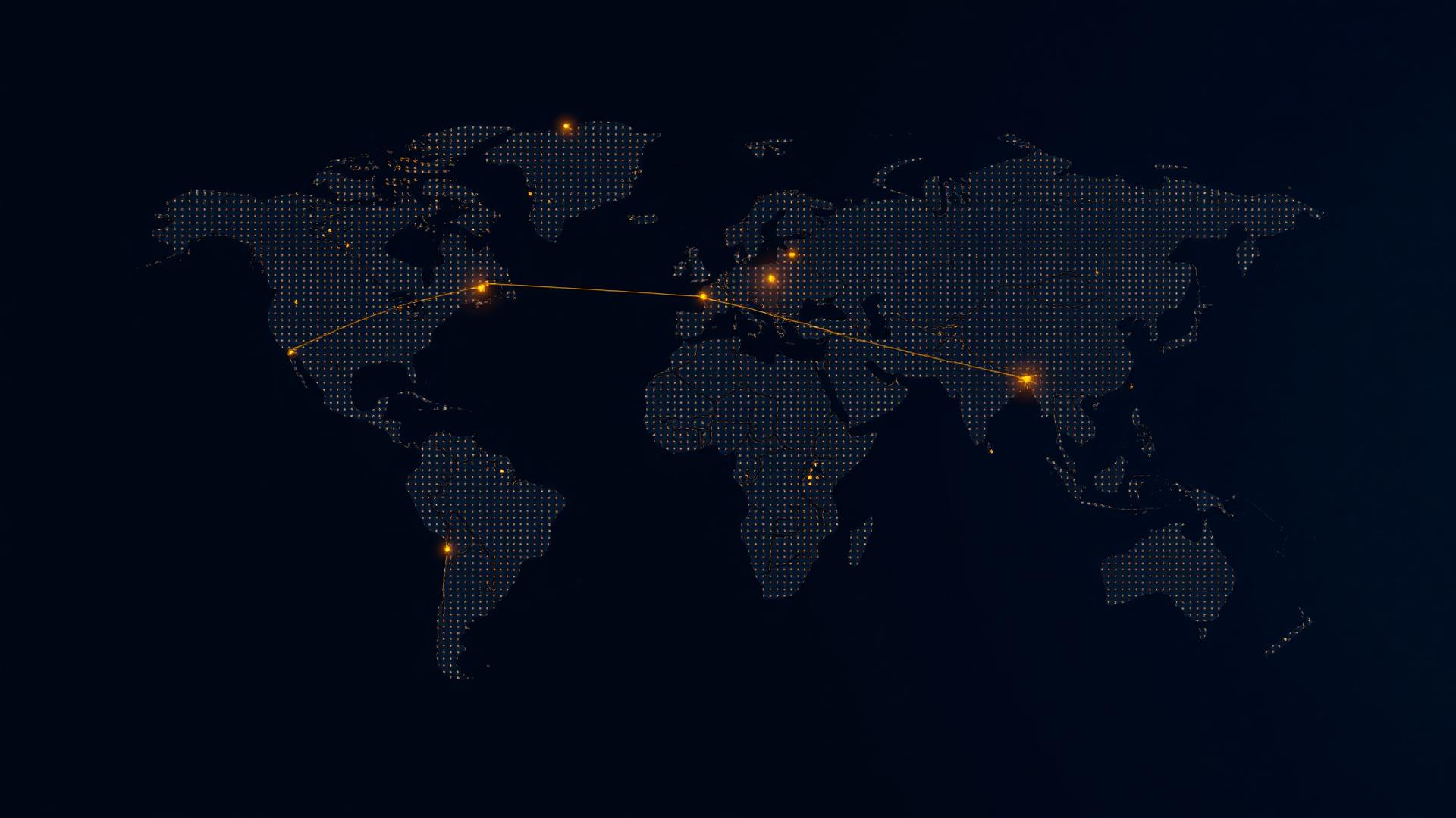 World map rendered in gold points on deep navy